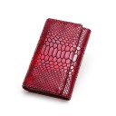 Portafoglio da donna con motivo lucido a serpente Rilievo a scaglie Chiusura a patta Vera pelle e poliestere Accessorio elegante per la borsa 1