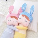 Poupée en peluche endormie 6