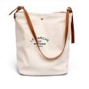 Przestronna damska torebka crossbody i torba na ramię Kremowe ciało z czarnym napisem Pasek z metalowymi klamrami 31 x 34 x 14 cm 2