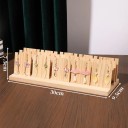 Puinen korvakoruteline 3 rivillä slotteja 30 × 7,5 × 9,5 cm luonnonpuuta pöytäteline korvakorujen ripustamiseen 2