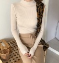 Pull à col roulé avec volants 10