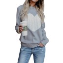 Pull en tricot pour femme avec un cœur 1