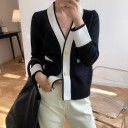 Pull féminin avec boutons et poches 4