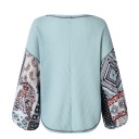Pull femme avec des manches amples et à motifs 1