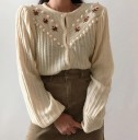Pull femme avec pompons 1