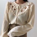 Pull femme avec pompons 2