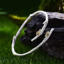 Pulseira aberta feminina com passarinhos 1