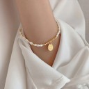 Pulseira feminina com pérolas H128 3