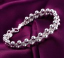 Pulseira feminina maciça com bolas 2