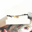 Pulsera de hilo con letra U