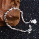 Pulsera de mujer con bolas de corazones y alas 2