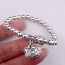 Pulsera de mujer con bolas y colgante H566 11