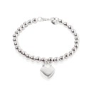 Pulsera de mujer con bolas y corazón 1