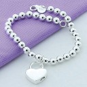 Pulsera de mujer con bolas y corazón 2