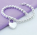 Pulsera de mujer con bolas y corazón 5