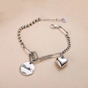 Pulsera de mujer con corazón y carita sonriente 2