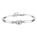 Pulsera de mujer con corazón y piedra. 1