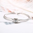 Pulsera de mujer con corazón y piedra. 2