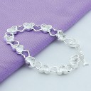 Pulsera de mujer con corazones en cierre americano 4