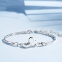Pulsera de mujer con corazones y piedras conectadas 3