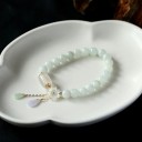 Pulsera de mujer con cuentas y flor 4