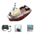 RC-laiva 6,5 x 12 x 7 cm Kaksoismootori 8 km/h 2,4 GHz 4 kanavaa LED-valot 30 m kantama Litiumakku 3,7 V 100 mAh USB-lataus Vesi lelu 3