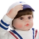 Realistisk pojke docka 60 cm Reborn baby med brunt hår och bruna ögon Marinblå kläder med mössa Nappflaska och napp i förpackningen 6