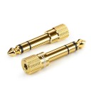 Reduktioliitin 6,35 mm uros 3,5 mm naaras kuulokkeille ja audio-laitteille Stereoadapteri uurretulla otteella Koko 4,5 x 1 cm 2