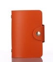 Reisdocumenten- en kaartenhoes met doorzichtige zakken Sluiting met metalen drukknoop Materiaal PU leer Afmetingen 10,7 x 7,5 cm 5