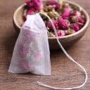 Sachets de thé vides avec cordon de serrage 100 pcs Pour thé en vrac et mélanges d'herbes faits maison Textile non tissé blanc Dimensions 7 x 5 cm 9