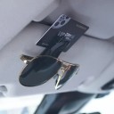 Sada dvou držáků na brýle karty vstupenky a pero do auta na sluneční clonu plastové černé klipy s pružinou praktické použití 5