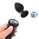 Sæt med sort silikone analplug med aftagelig sten og minivibrator. Diskret emballage. 3