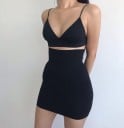Saia mini ajustada para senhora com cintura alta Cintura larga e elástica Corte justo Cor preta Poliéster e spandex Tecido elástico 4