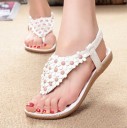 Sandalias de mujer decoradas con flores. 1