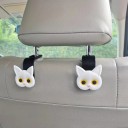 Set aus zwei Autohaltern in Form eines Katzenkopfes für die Kopfstütze, als würde eine Katze eine Tasche, Brille oder Kleidung im Mund halten, aus ABS 5