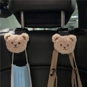 Set de două suporturi auto cu cap de ursuleț pe spătarul scaunului cap de pluș cârlig din plastic pentru genți ochelari îmbrăcăminte și mărunțișuri 2