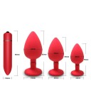 Set de tres tapones anales rojos de diferentes tamaños con piedra transparente extraíble y vibrador. Embalaje discreto. 3