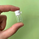 Set di 10 bottigliette di vetro trasparenti da 2 ml 3,1 x 1,3 cm Contenitori da viaggio con tappo per siero viso struccante o essenza 4