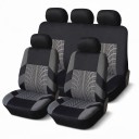 Set di coprisedili per 5 posti 9 pezzi Coprisedili universali con stampa di pneumatici in poliestere Compatibili con airbag 1