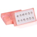 Set di orecchini a bottone da donna 12