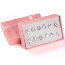 Set di orecchini a bottone da donna 4