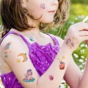 Set med tillfälliga tatueringar med sjöjungfrur, enhörningar, stjärnor, regnbågar och andra motiv färgglada vattenresistenta tatuering klistermärken 2