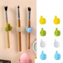 Set of Two Self-Adhesive Holders for Cables, Glasses and Small Items for Car and Home in the Shape of a Hand with a Thumbs Up Made of Rubber 9