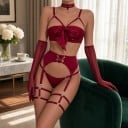 Sexy spodní prádlo podprsenka s velkou mašlí a podvazkový opasek se šněrováním a tanga doplněné podvazky na stehna a dlouhými rukavicemi 4