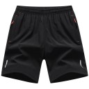 Short de sport pour homme avec taille élastique Short d'entraînement respirant avec poches zippées Éléments réfléchissants Short de course confortable 3