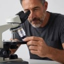 Silberner achromatischer Immersionsobjektiv 100x für Öl mit einer Apertur von 1,25 für biologisches Mikroskop mit konjugierter Entfernung von 185 mm 2