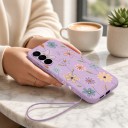 Silikoncover til Samsung Galaxy S24 med håndledssnor og motiv af tegnede blomster, beskyttelse af kameraet 11