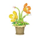 Skládačka květina žlutá a oranžová orchidej v béžovém květináči 12 × 8,3 cm dekorace z plastových kostek 1
