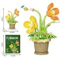 Sklădață floare orhidee galbenă și portocalie în ghiveci bej 12 × 8,3 cm decorare din blocuri de plastic 2