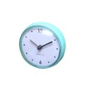 Small analogue clock with a round plastic body and transparent cover Clear white dial Dimensions 7.2 x 4 cm Powered by 1x AAA battery 4